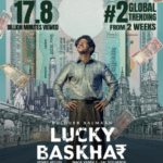 Lucky Baskhar movie poster featuring Dulquer Salmaan, showcasing the trending financial crime drama that is winning global attention